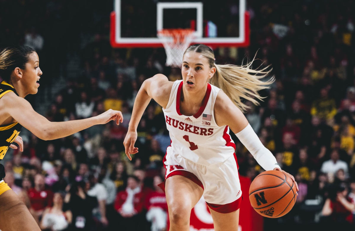 Nebraska's Jaz Shelley dribbles the ball upcourt against the Hawkeyes during the first half Sunday at Pinnacle Bank Arena in Lincoln.
